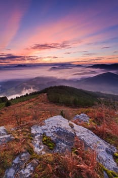 Mountains over the fog in the winter sunrise, Bizkaia, Spain
