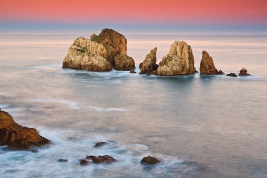 Amazing seascape sunrise at winter. Los Urros, Spain