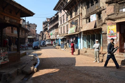 typical Nepal streetscene with some people walking