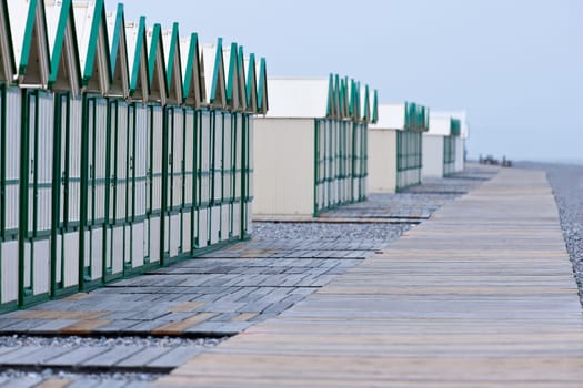 Row of beach huts before rain