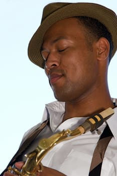 An youung and trendy African-American sax musician