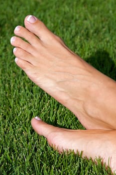 Relaxed feet of a woman laying down