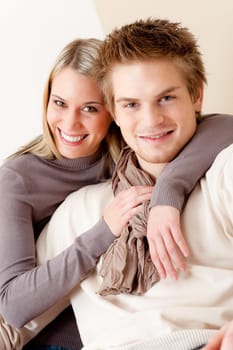 Couple in love - happy relax at home together in living room