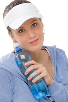Sport - young woman in summer fitness outfit with water bottle
