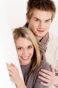 Couple in love - happy relax at home together in living room