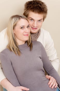 Couple in love - happy relax at home together in living room