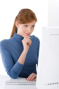 Modern office - young business woman work at computer