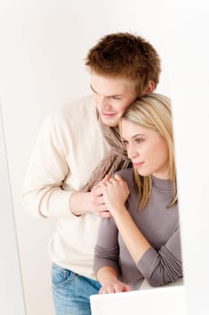 Couple in love - happy relax at home together in living room