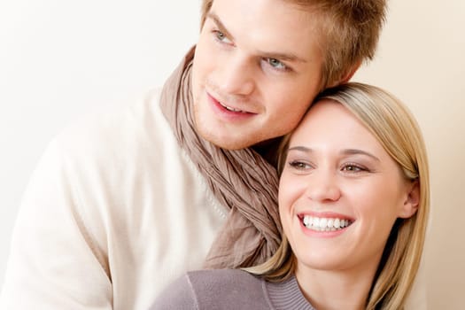 Couple in love - happy relax at home together in living room