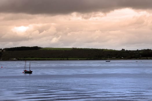 boats on the river edge in youghal a beautiful irish town on the coast