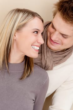 Couple in love - happy relax at home together in living room