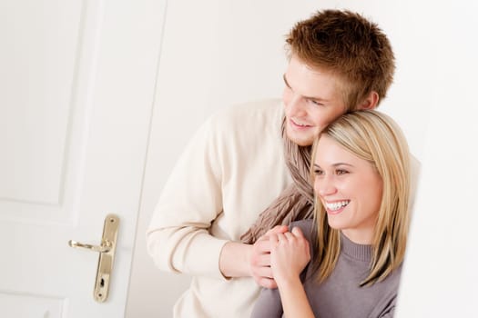 Couple in love - happy relax at home together in living room