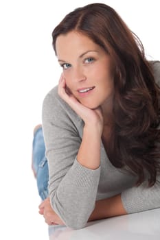 Brown hair sexy woman lying down on white background