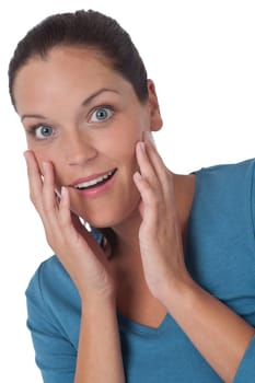 Surprised happy young woman in turquoise vest on white background