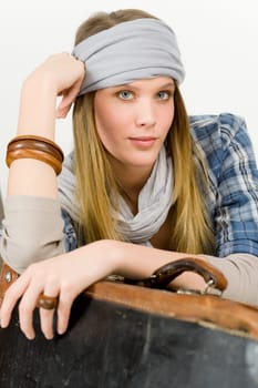 Fashion model - young woman posing in country style clothes