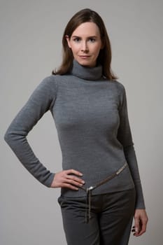 Woman gray turtleneck sweater