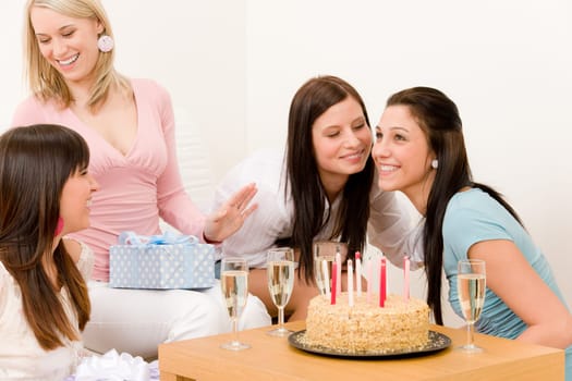 Birthday party - woman getting present, celebrating with champagne and cake