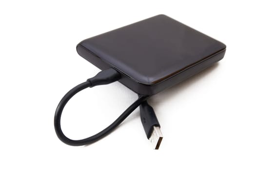 Portable external HDD hard disk drive with USB cable on white background