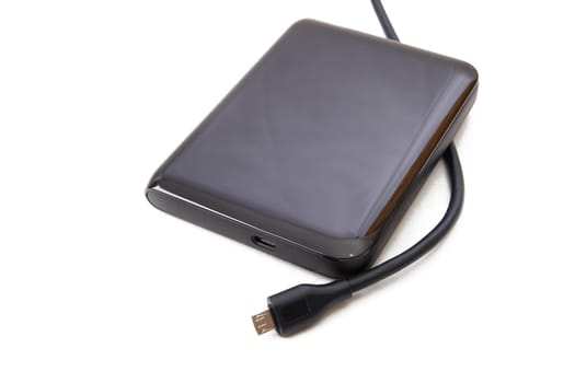Portable external HDD hard disk drive with USB cable on white background