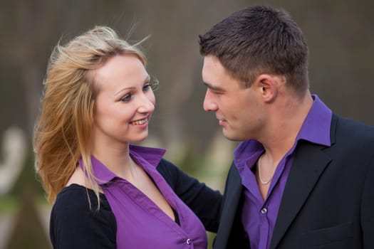 happy and laughing couple in a park