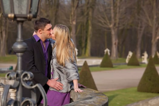 love couple kissing in a city park