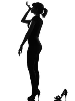 silhouette woman smelling perfume