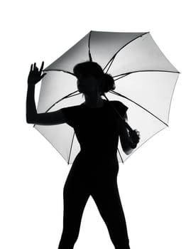 silhouette woman holding open umbrella