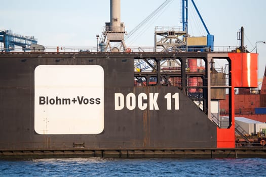 Blohm + Voss shipyard - floating dry dock on the Elbe River in Hamburg Germany