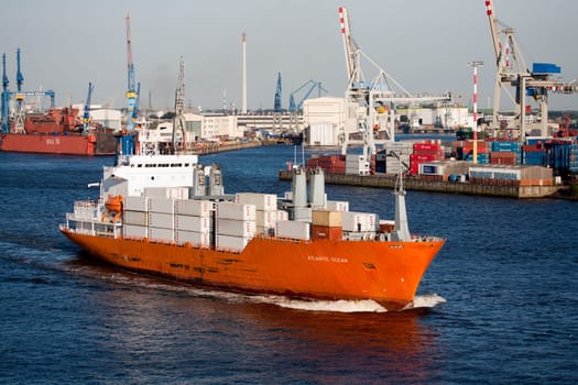 Freighter on the Elbe River in Hamburg Harbor, Germany.