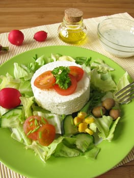 Fresh goat cheese on salad