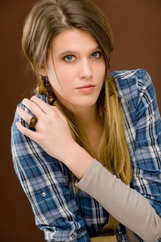 Fashion model - young woman posing in country style clothes