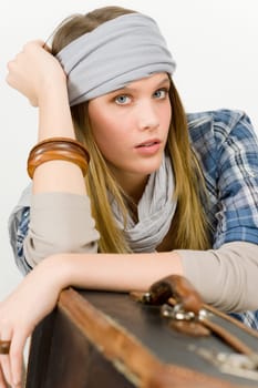Fashion model - young woman posing in country style clothes