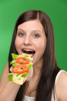 Healthy lifestyle - woman enjoy cheese tomato sandwich