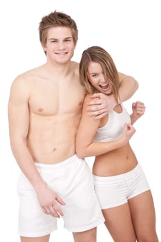 Fitness - Young sportive smiling couple having fun after training on white background