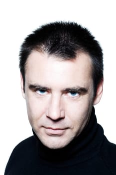 handsome caucasian man serious seductor smiling short brown with polo turtle neck hair blue eyes portrait expressing portrait on studio isolated white background