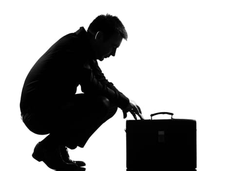 silhouette caucasian business man  expressing fatigue despair tired behavior briefcase  full length on studio isolated white background