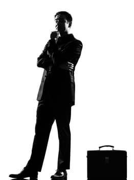 silhouette caucasian business man thinking pensive behavior full length on studio isolated white background
