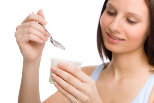 Healthy lifestyle - portrait of young woman eat yogurt
