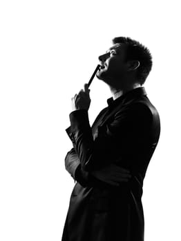 silhouette caucasian business man thinking pensive behavior full length on studio isolated white background