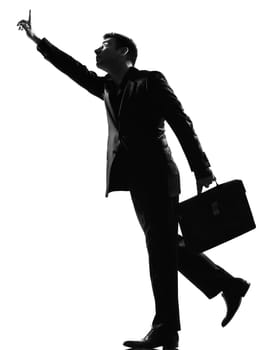 silhouette caucasian business man  running hailing full length on studio isolated white background