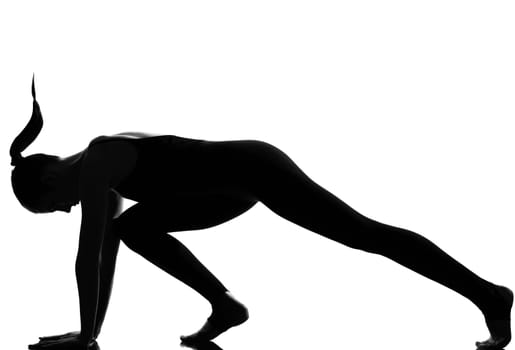 beautiful caucasian tall woman ballet dancer stretching warming up full length on studio isolated white background