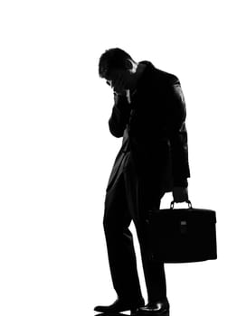 silhouette caucasian business man  expressing fatigue despair tired behavior full length on studio isolated white background