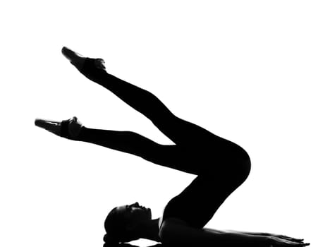 beautiful caucasian tall woman ballet dancer halasana Shoulder Stand yoga pose full length on studio isolated white background
