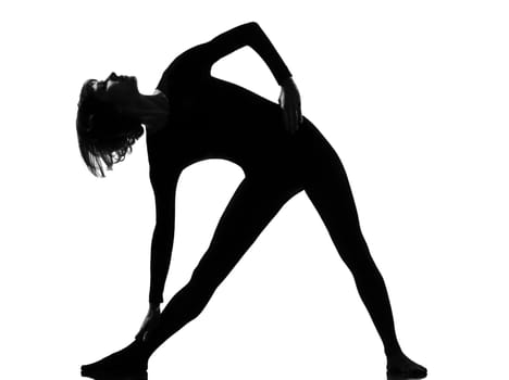 utthita trikonasana triangle pose position woman posture position in silhouette on studio white background