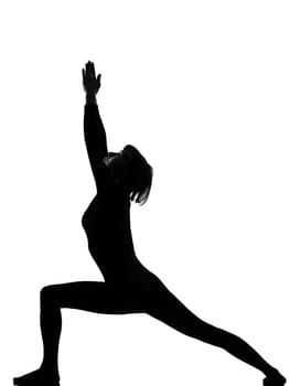 woman virabhadrasana warrior postion yoga pose posture position in silouhette on studio white background