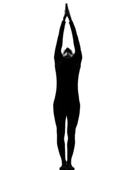 woman sun salutation yoga surya namaskar posture position in silouhette on studio white background full length