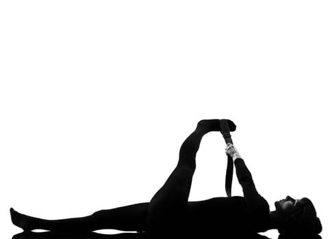 woman supta padangusthasana 2  Hand To Big Toe Pose posture position in silouhette on studio white background