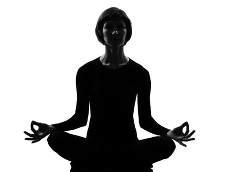 woman lotus pose yoga Padmasana posture position in silouhette on studio white background