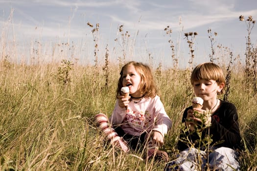Children eat ice cream