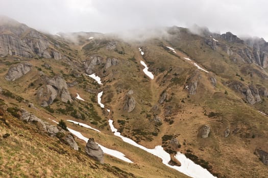 mountains in clouds in Ciucas mountains, Romania